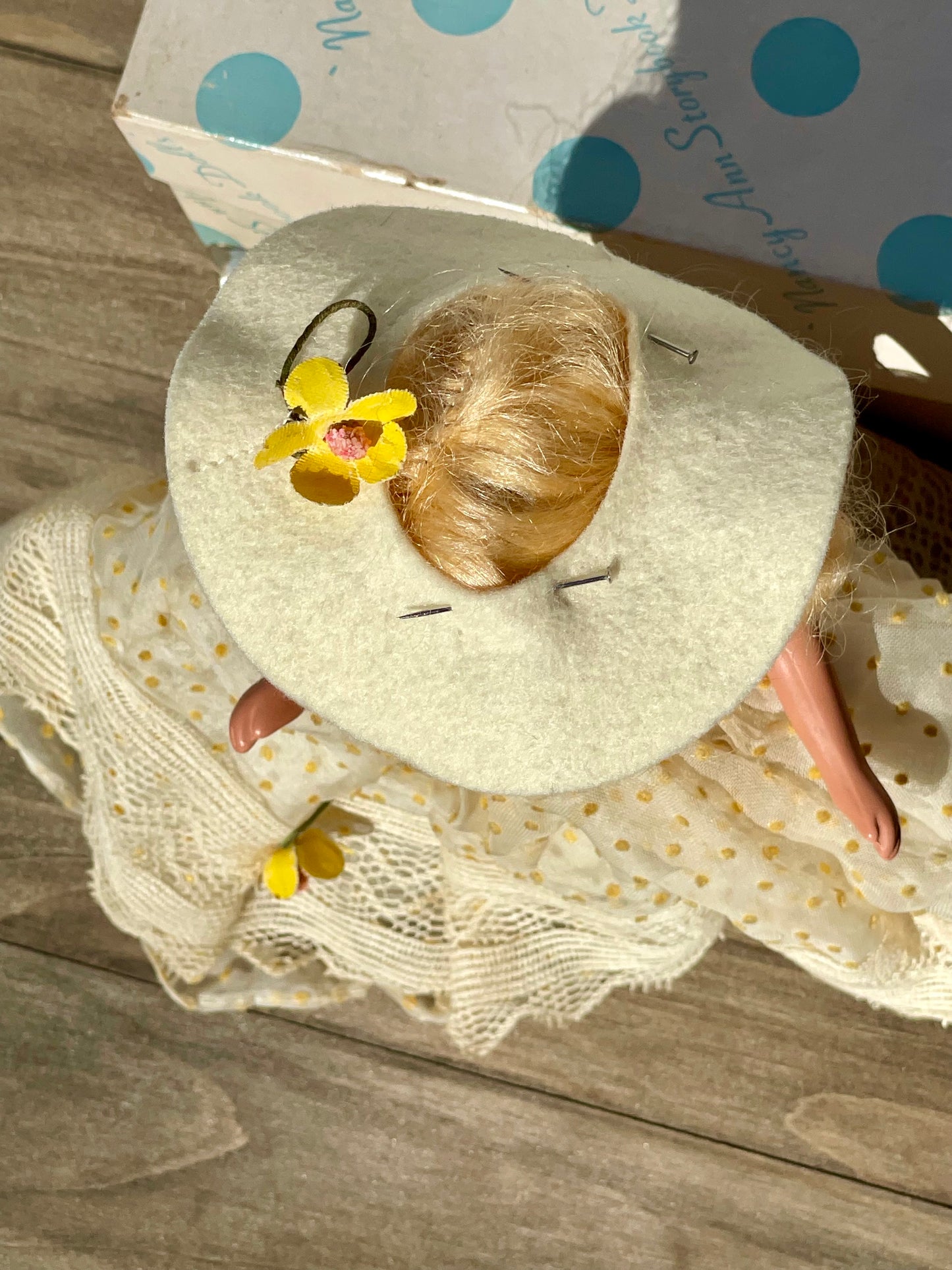 Nancy Ann storybook doll season series 91 summer doll antique collector doll yellow dress blonde hair yellow flower on hat original box frozen legs free shipping antique gift collector gift thebrokenbirdcompany christmas birthday gift for her mothers day 1940s collector doll cream colored box with blue polka dots