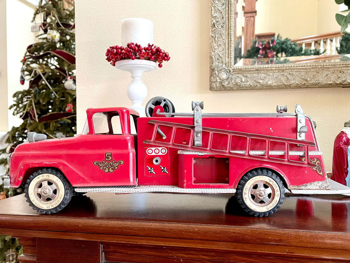 Antique 1957 Tonka Toy Suburban Pumper Fire Engine No. 5 engine red antique pressed steel 1957 edition of the Tonka Toy Fire engine number 5 original red steel ladder and rubber hose the broken bird company antique gifts rare tonka toy fire fighter