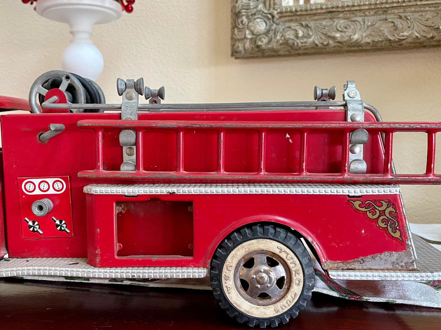 Antique 1957 Tonka Toy Suburban Pumper Fire Engine No. 5 engine red antique pressed steel 1957 edition of the Tonka Toy Fire engine number 5 original red steel ladder and rubber hose the broken bird company antique gifts rare tonka toy fire fighter