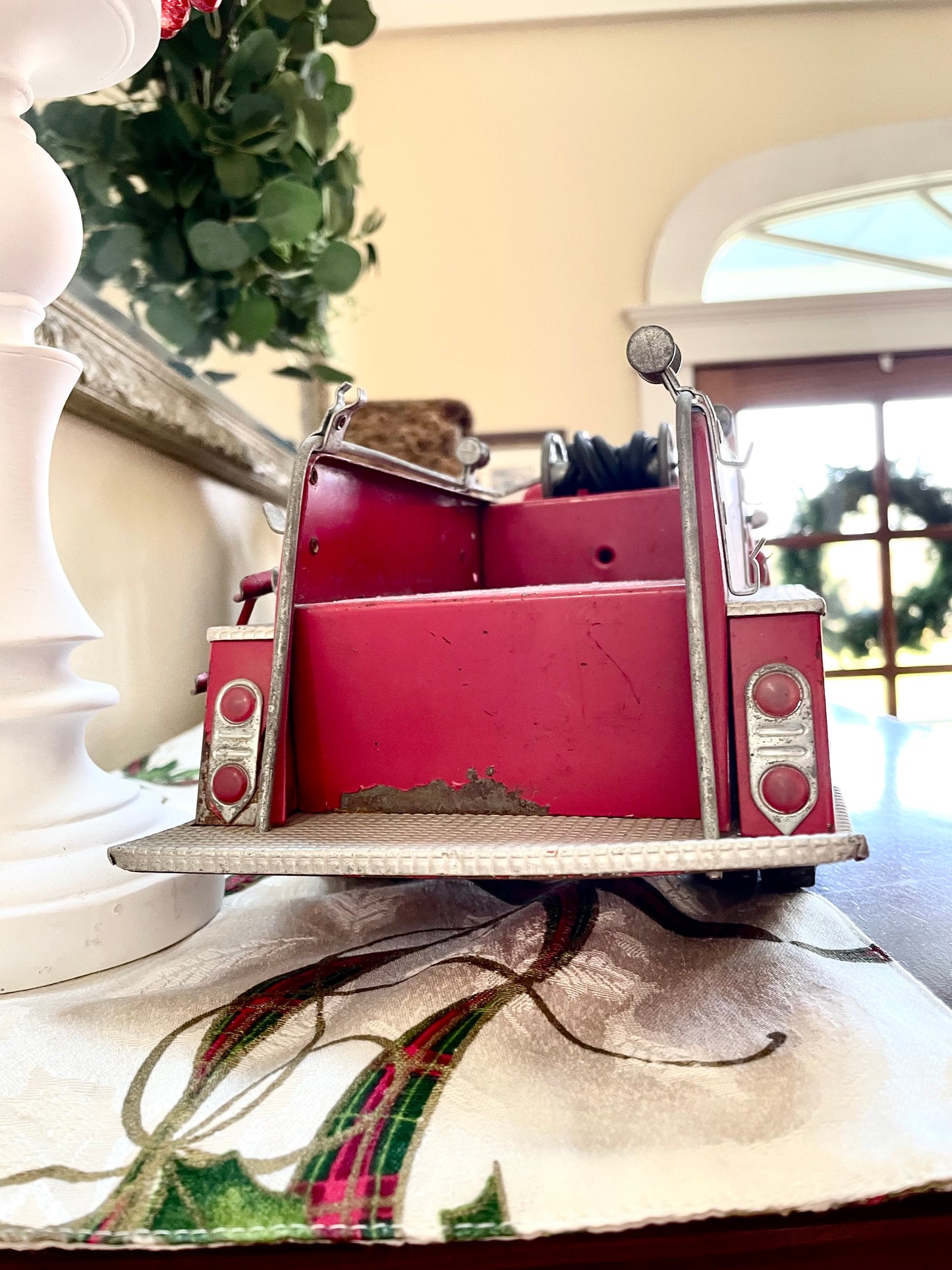 Antique 1957 Tonka Toy Suburban Pumper Fire Engine No. 5 engine red antique pressed steel 1957 edition of the Tonka Toy Fire engine number 5 original red steel ladder and rubber hose the broken bird company antique gifts rare tonka toy fire fighter