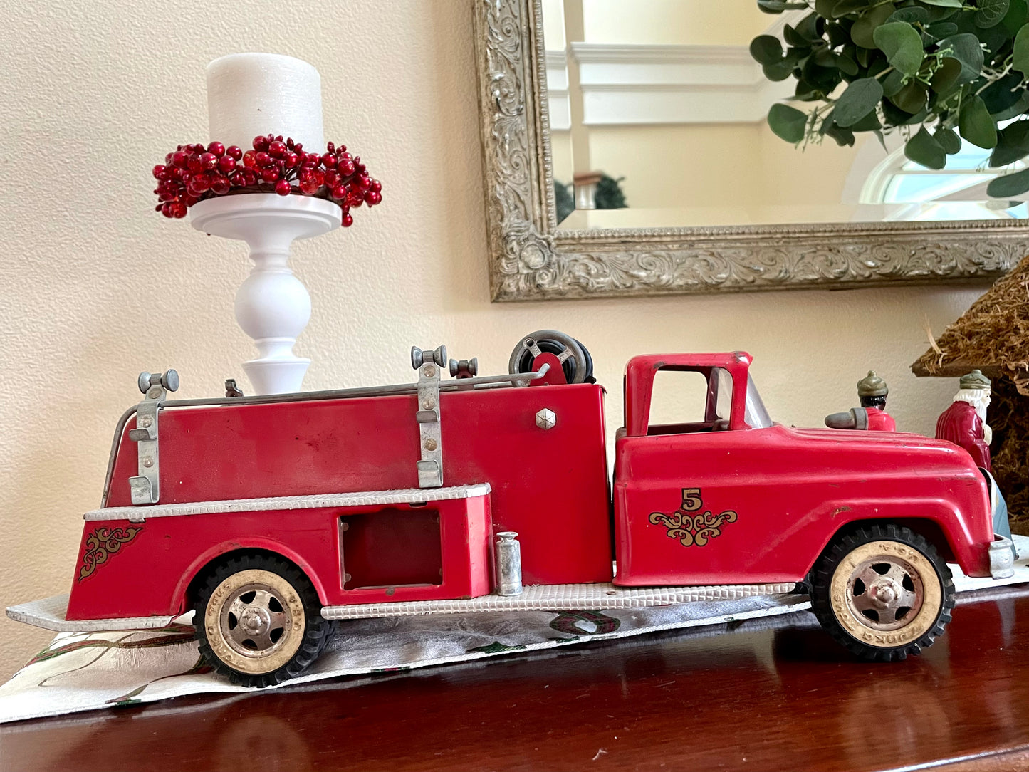 Antique 1957 Tonka Toy Suburban Pumper Fire Engine No. 5 engine red antique pressed steel 1957 edition of the Tonka Toy Fire engine number 5 original red steel ladder and rubber hose the broken bird company antique gifts rare tonka toy fire fighter