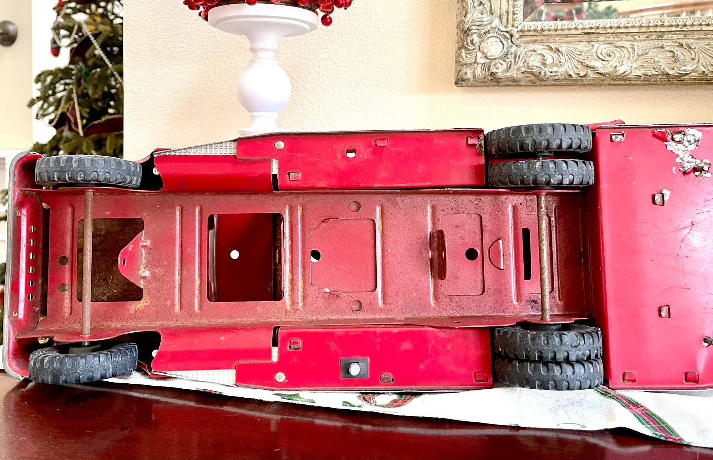 Antique 1957 Tonka Toy Suburban Pumper Fire Engine No. 5 engine red antique pressed steel 1957 edition of the Tonka Toy Fire engine number 5 original red steel ladder and rubber hose the broken bird company antique gifts rare tonka toy fire fighter