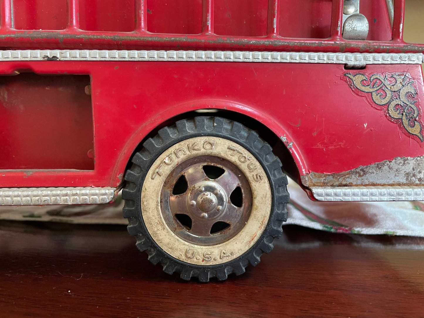 Antique 1957 Tonka Toy Suburban Pumper Fire Engine No. 5 engine red antique pressed steel 1957 edition of the Tonka Toy Fire engine number 5 original red steel ladder and rubber hose the broken bird company antique gifts rare tonka toy fire fighter