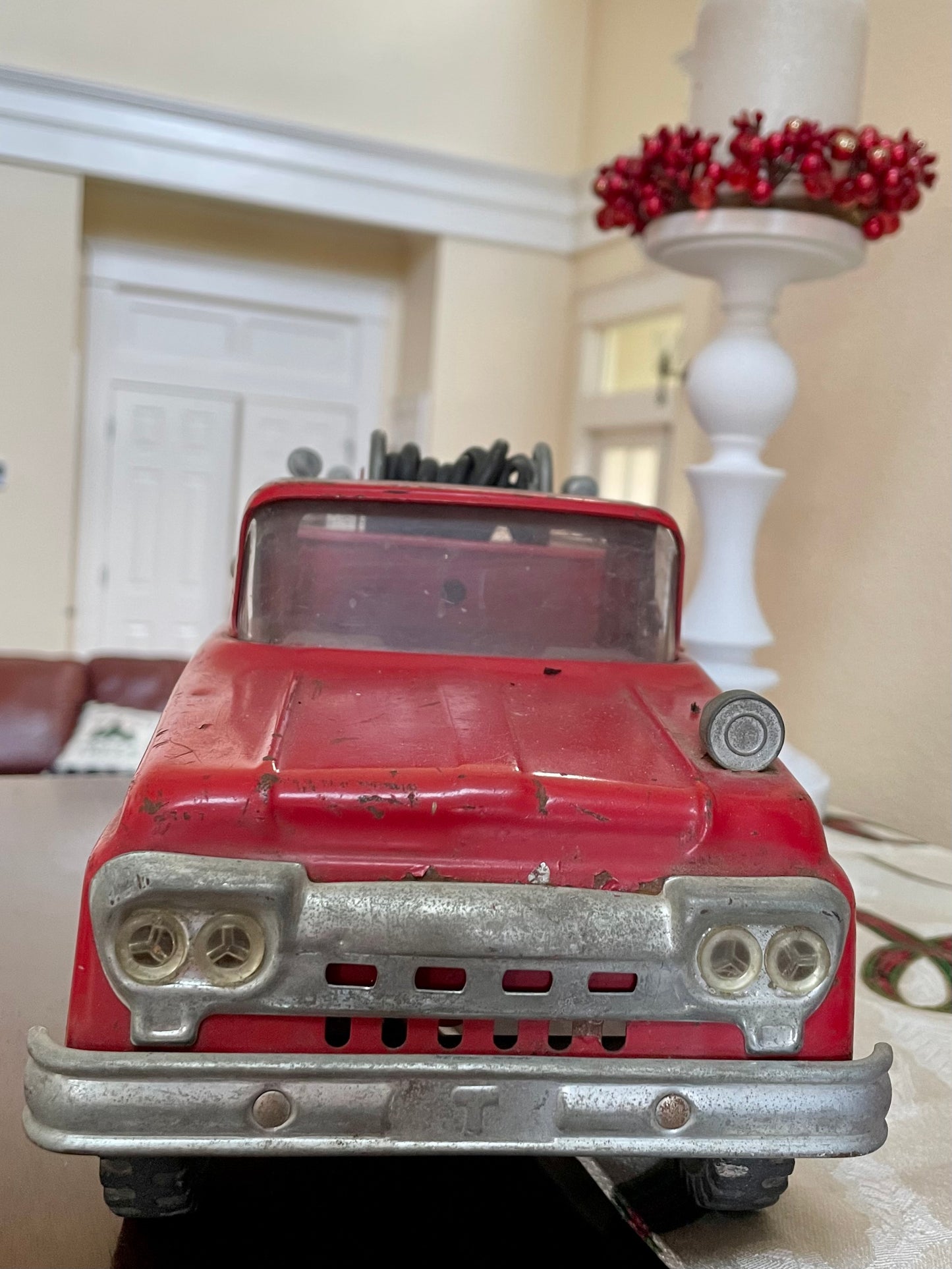 Antique 1957 Tonka Toy Suburban Pumper Fire Engine No. 5 engine red antique pressed steel 1957 edition of the Tonka Toy Fire engine number 5 original red steel ladder and rubber hose the broken bird company antique gifts rare tonka toy fire fighter