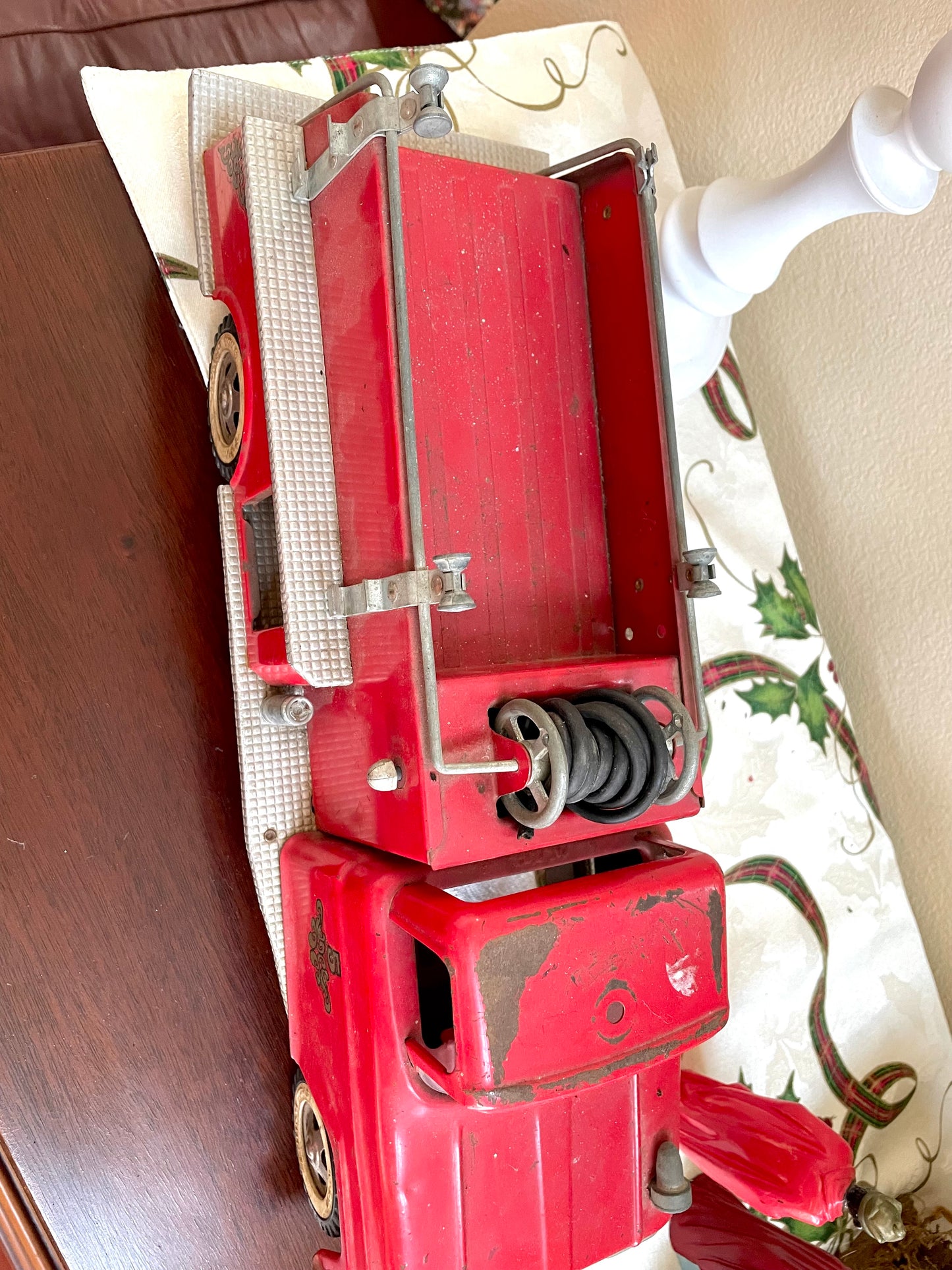 Antique 1957 Tonka Toy Suburban Pumper Fire Engine No. 5 engine red antique pressed steel 1957 edition of the Tonka Toy Fire engine number 5 original red steel ladder and rubber hose the broken bird company antique gifts rare tonka toy fire fighter