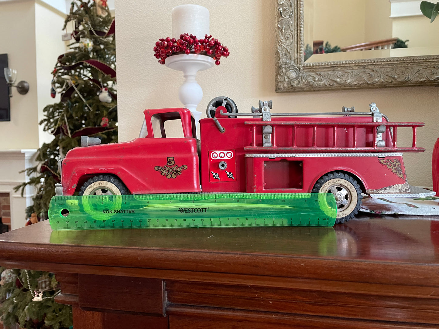 Antique 1957 Tonka Toy Suburban Pumper Fire Engine No. 5 engine red antique pressed steel 1957 edition of the Tonka Toy Fire engine number 5 original red steel ladder and rubber hose the broken bird company antique gifts rare tonka toy fire fighter