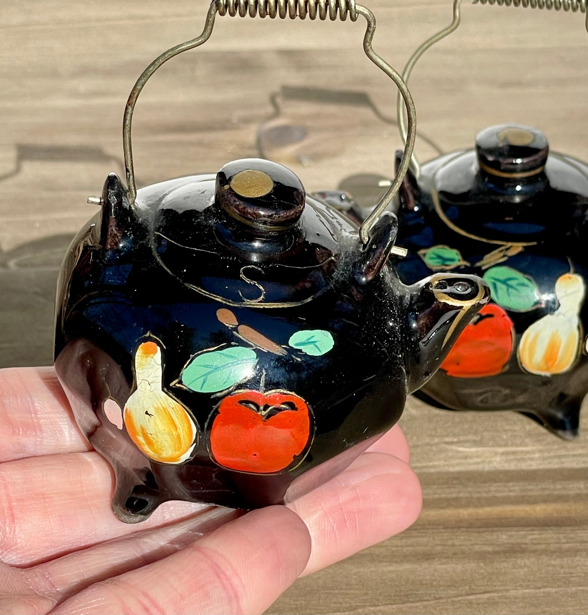 Vintage Mini Black Glazed Tea Pot Hand Painted Salt and Pepper Shakers Made in Japan Metal Wire Handles TheBrokenBird Company S&P shakers modern kitchen tea lovers