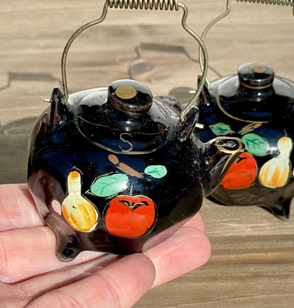 Vintage Mini Black Glazed Tea Pot Hand Painted Salt and Pepper Shakers Made in Japan Metal Wire Handles TheBrokenBird Company S&P shakers modern kitchen tea lovers