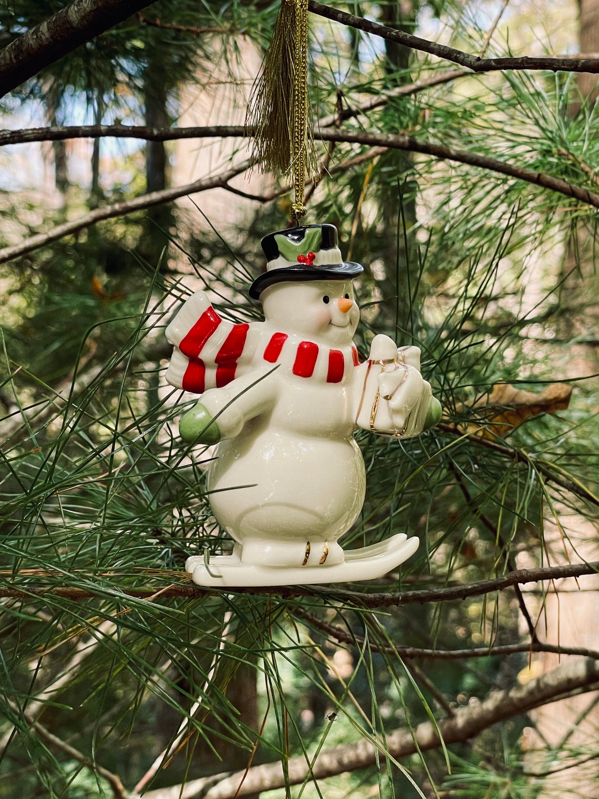 2017 Lenox Very Merry Christmas Snowman Skiing porcelain 24k gold accent christmas ornament rare discontinued collection Lenox Snowman with red scarf and green gloves christmas ornaments christmas gifts lenox christmas 3.5 inch 