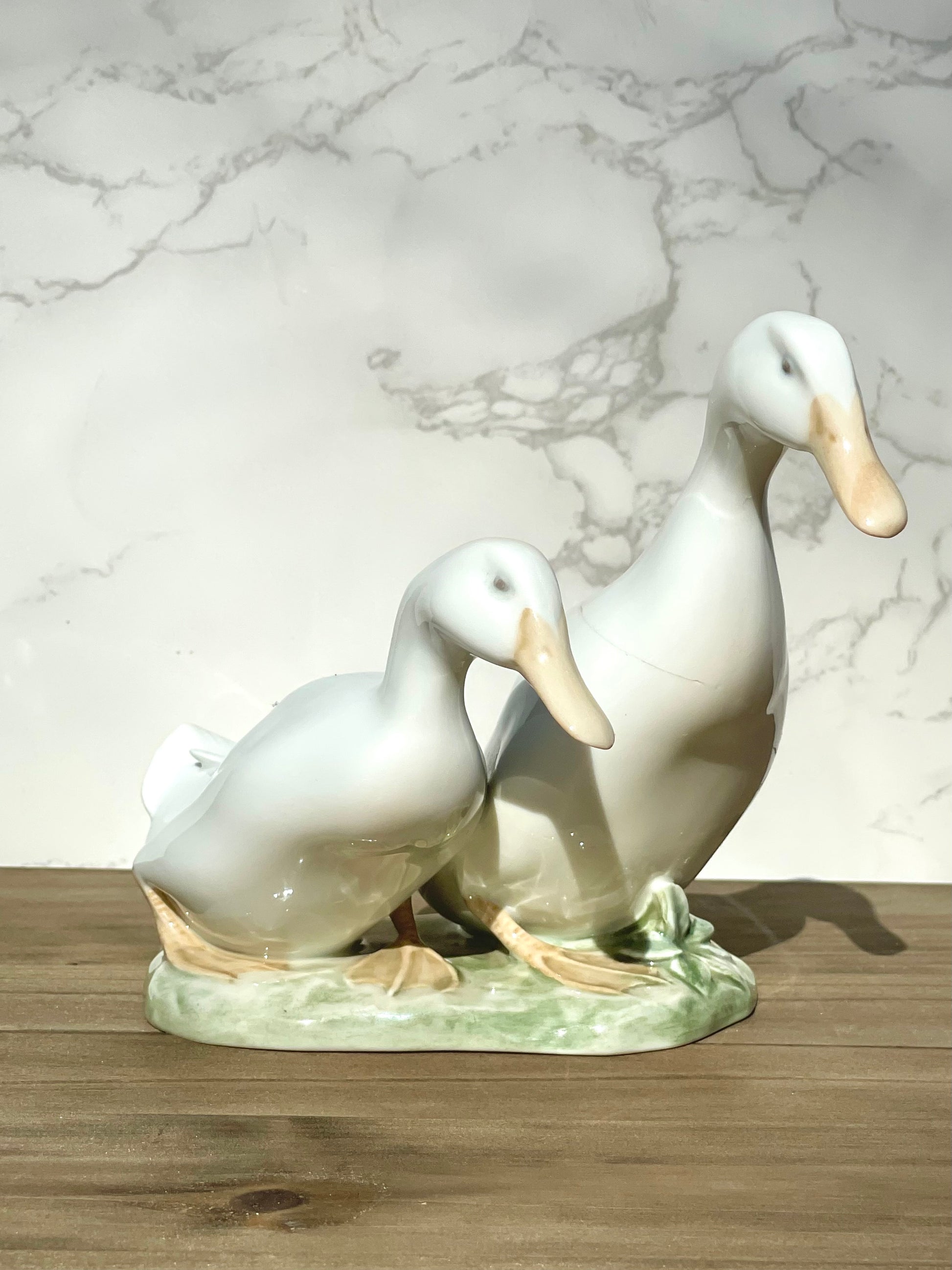 Royal copenhagen 1961 drake and duck figurine 2128 SF designed by olaf mathiesen in 1920s duck lovers gift duck statue thebrokenbirdcompany free shipping house warming gift rare RC statue Ducks walking 5.25 inch height discontinued royal copenhagen figurines white ducks green grass base