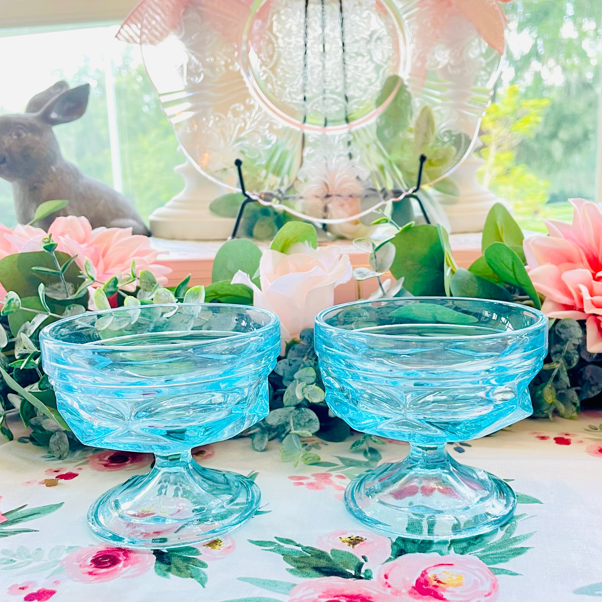 vintage king's crown thumbprint 
- indiana glass teal blue 
- king's crown thumbprint blue 
- 1970s champagne glasses 
- vintage sherbet glasses 
- teal blue coupe glasses 
- mid century glassware 
- pressed glass dessert cups 
- baby blue stemware 
- indiana glass thumbprint 
- retro barware 
- vintage blue champagne coupes  Thebrokenbirdcompany 