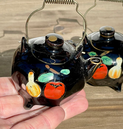 Vintage Mini Black Glazed Tea Pot Hand Painted Salt and Pepper Shakers Made in Japan Metal Wire Handles TheBrokenBird Company S&P shakers modern kitchen tea lovers