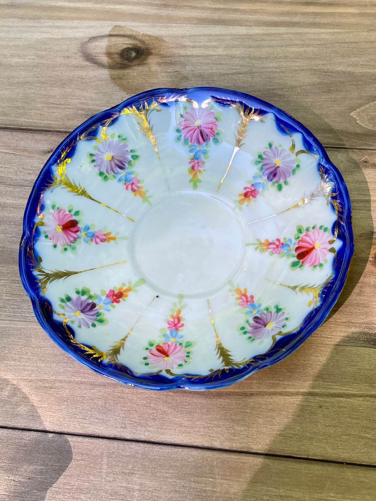 antique-nippon saucer-japanese-porcelain-plate-cobalt-blue-rim-dish-gold-moriage-accents-hand-painted-floral-design-tea-saucer vintage gift rare decorative plate thebrokenbirdcompany gift for her cobalt blue plate