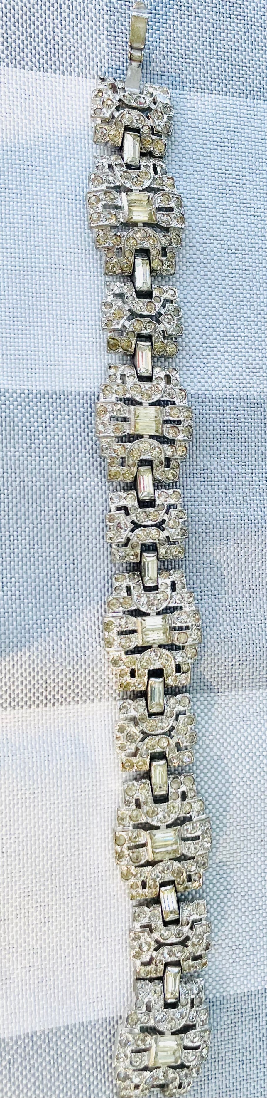 geometric silver links set with elongated baguette-cut clear rhinestones antique Rhinestone art deco bracelet geometric shapes 
hector aguilar jewelry
- taller borda taxco
- eagle 31 hallmark
- hector aguilar bracelet
- taxco sterling silver
- hector aguilar vintage
- mexican sterling bracelet
- eagle mark taxco
- hector aguilar art deco
- taxco eagle 31
- vintage jewelry 