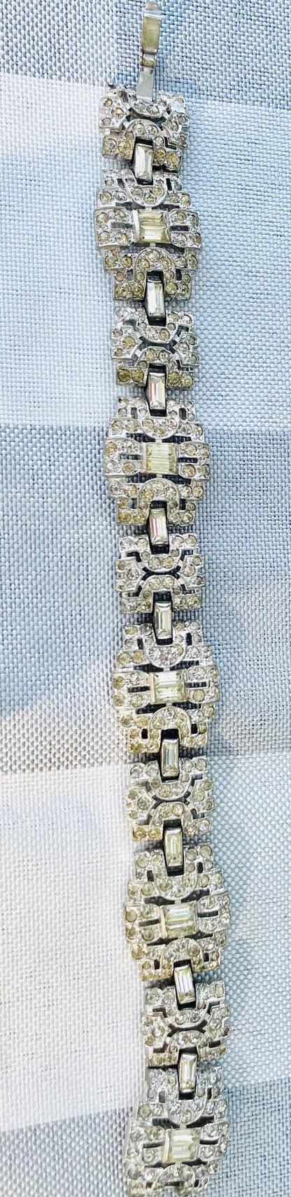geometric silver links set with elongated baguette-cut clear rhinestones antique Rhinestone art deco bracelet geometric shapes 
hector aguilar jewelry
- taller borda taxco
- eagle 31 hallmark
- hector aguilar bracelet
- taxco sterling silver
- hector aguilar vintage
- mexican sterling bracelet
- eagle mark taxco
- hector aguilar art deco
- taxco eagle 31
- vintage jewelry 