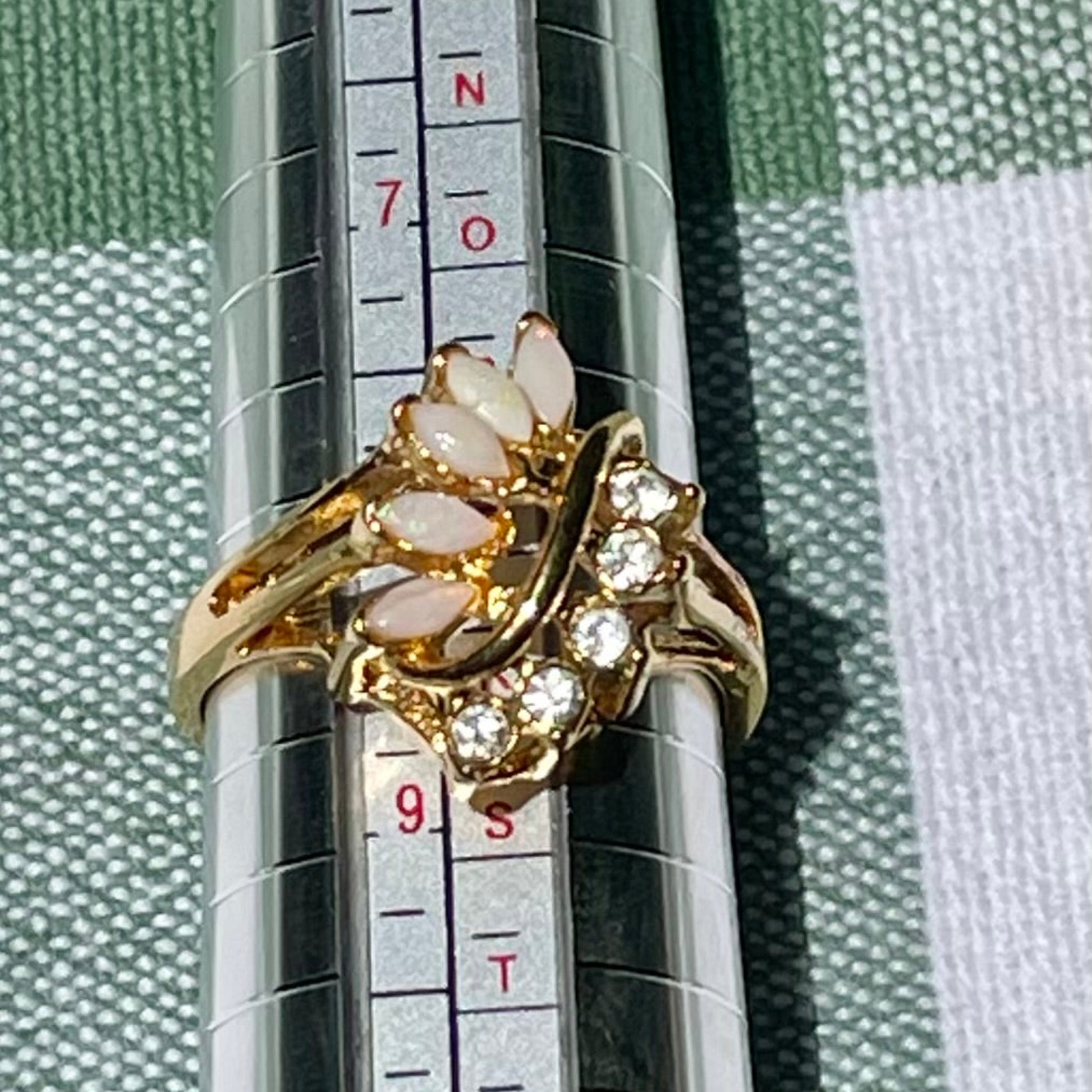 vintage_opal_and_lab_created_diamonds_on_gold_tone_ring_thebrokenbirdcompany_free_shipping_vintage_jewleryvintage opal and lab grown diamond leaf style statement ring avon vintage ring size 8.5 gift thebrokembirdcompany gift shiny ring 5 stone