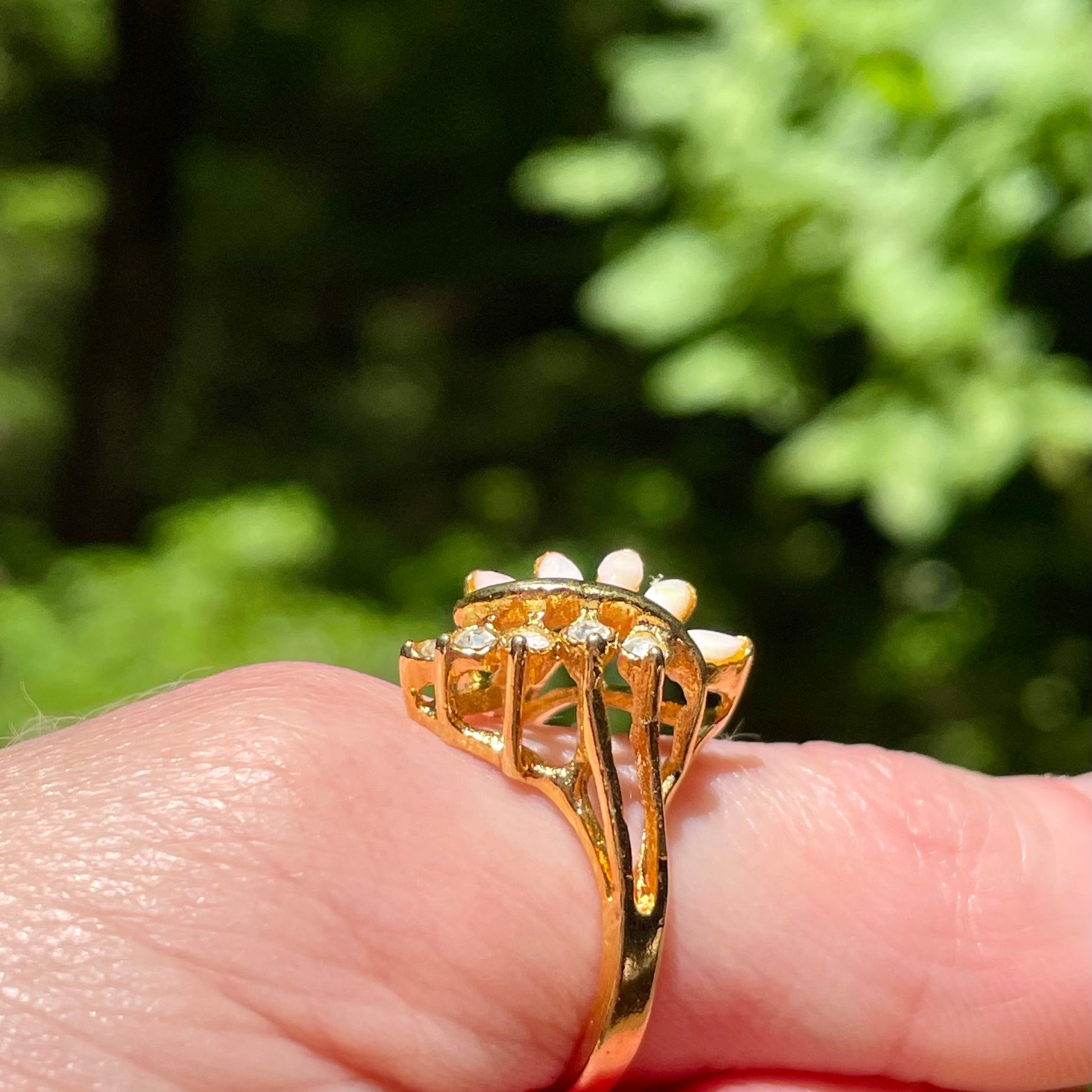 Gold ring with decorative design vintage_opal_and_lab_created_diamonds_on_gold_tone_ring_thebrokenbirdcompany_free_shipping_vintage_jewlery