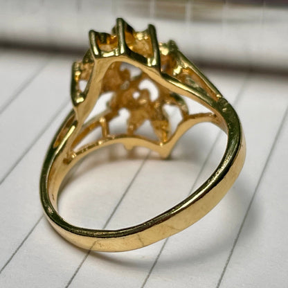 Gold ring with intricate design vintage_opal_and_lab_created_diamonds_on_gold_tone_ring_thebrokenbirdcompany_free_shipping_vintage_jewlery