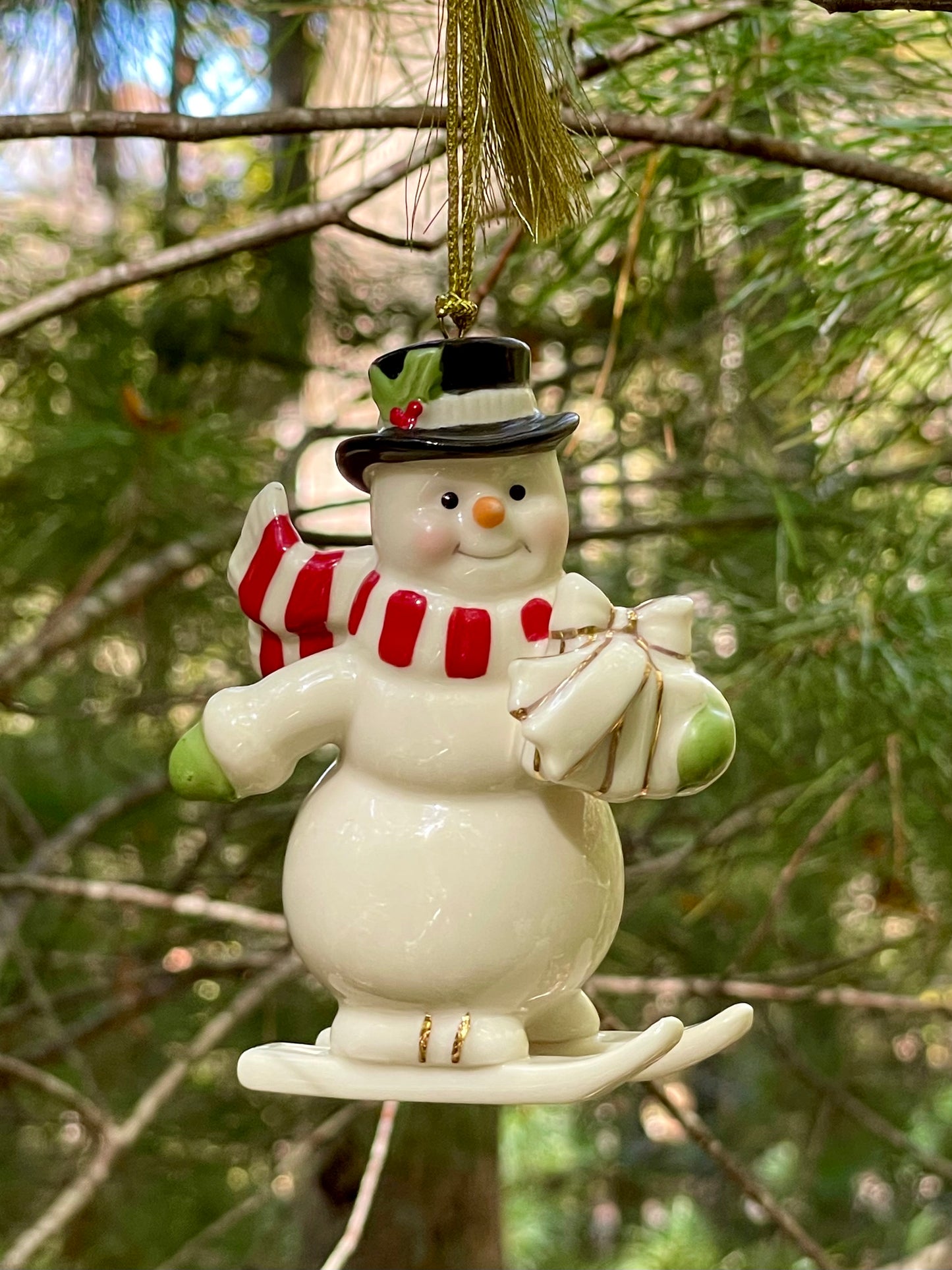 2017 Lenox Very Merry Christmas Snowman Skiing porcelain 24k gold accent christmas ornament rare discontinued collection Lenox Snowman with red scarf and green gloves christmas ornaments christmas gifts lenox christmas 3.5 inch 
