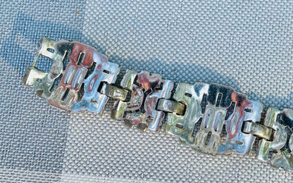 geometric silver links set with elongated baguette-cut clear rhinestones antique Rhinestone art deco bracelet geometric shapes 
hector aguilar jewelry
- taller borda taxco
- eagle 31 hallmark
- hector aguilar bracelet
- taxco sterling silver
- hector aguilar vintage
- mexican sterling bracelet
- eagle mark taxco
- hector aguilar art deco
- taxco eagle 31
- vintage jewelry 