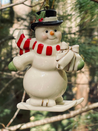 2017 Lenox Very Merry Christmas Snowman Skiing porcelain 24k gold accent christmas ornament rare discontinued collection Lenox Snowman with red scarf and green gloves christmas ornaments christmas gifts lenox christmas 3.5 inch 