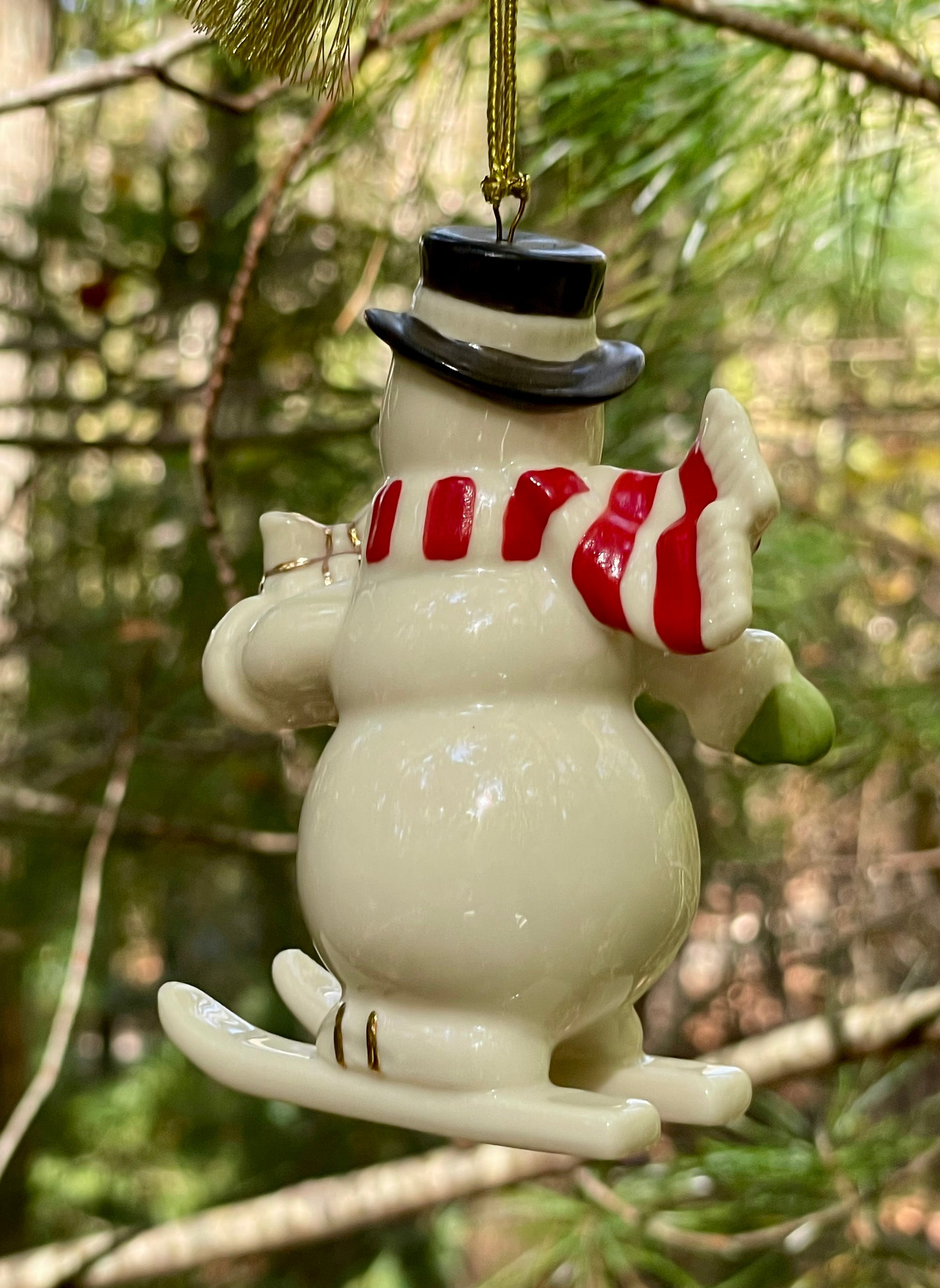 2017 Lenox Very Merry Christmas Snowman Skiing porcelain 24k gold accent christmas ornament rare discontinued collection Lenox Snowman with red scarf and green gloves christmas ornaments christmas gifts lenox christmas 3.5 inch 