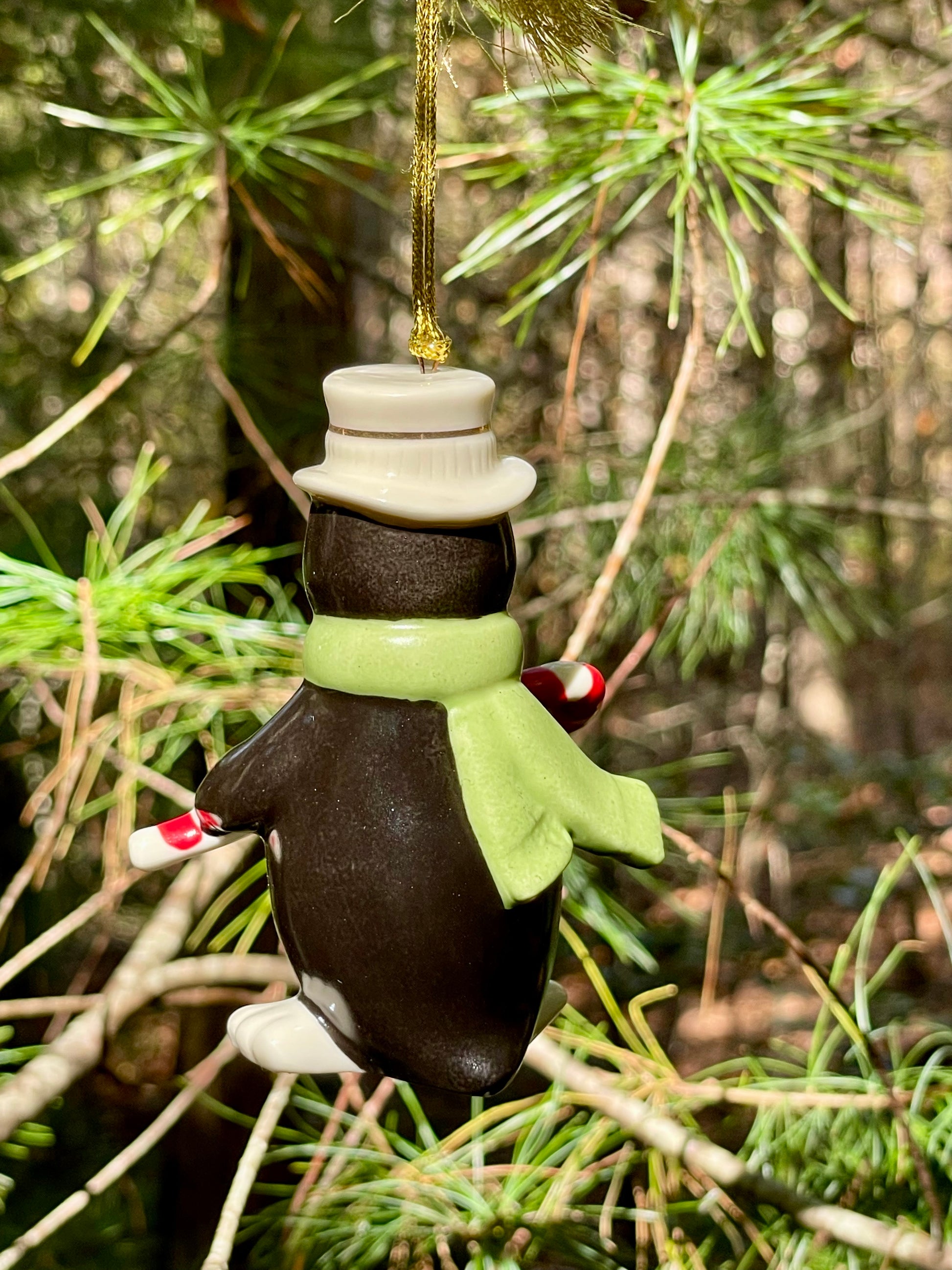 vintage 1990s Lenox Christmas Ornament Penguin holding a candy cane with top hat and green scarf 3.5 inch very merry christmas collection rare lenox gift babys first christmas gift collection set free shipping thebrokenbirdcompany christmas decor christmas ornaments vintage christmas decor holiday ornaments
