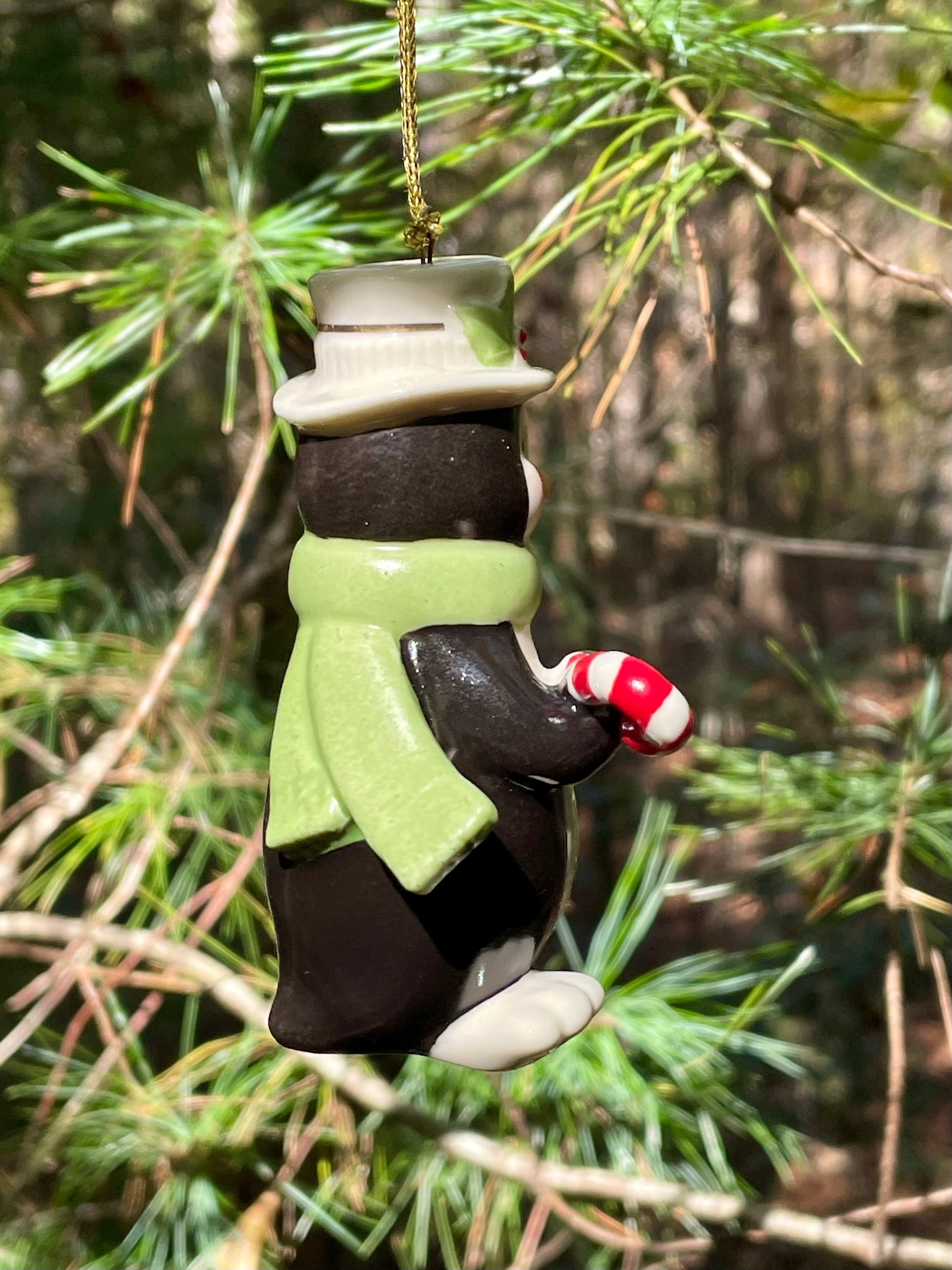 vintage 1990s Lenox Christmas Ornament Penguin holding a candy cane with top hat and green scarf 3.5 inch very merry christmas collection rare lenox gift babys first christmas gift collection set free shipping thebrokenbirdcompany christmas decor christmas ornaments vintage christmas decor holiday ornaments