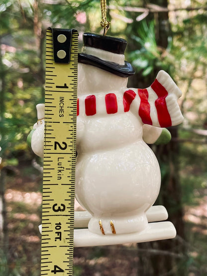 2017 Lenox Very Merry Christmas Snowman Skiing porcelain 24k gold accent christmas ornament rare discontinued collection Lenox Snowman with red scarf and green gloves christmas ornaments christmas gifts lenox christmas 3.5 inch 