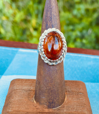 amber ring   - sterling silver amber ring   - oval amber ring   - halo amber ring   - rope halo ring   - braided silver ring   - natural amber inclusions   - cabochon amber ring   - baltic amber ring   - vintage amber ring   - statement amber ring   - size 6 amber ring   - sterling silver halo ring   - boho amber jewelry   - natural sediment amber cognac amber ring  fossilized resin ring Thebrokenbirdcompany free shipping gift for her