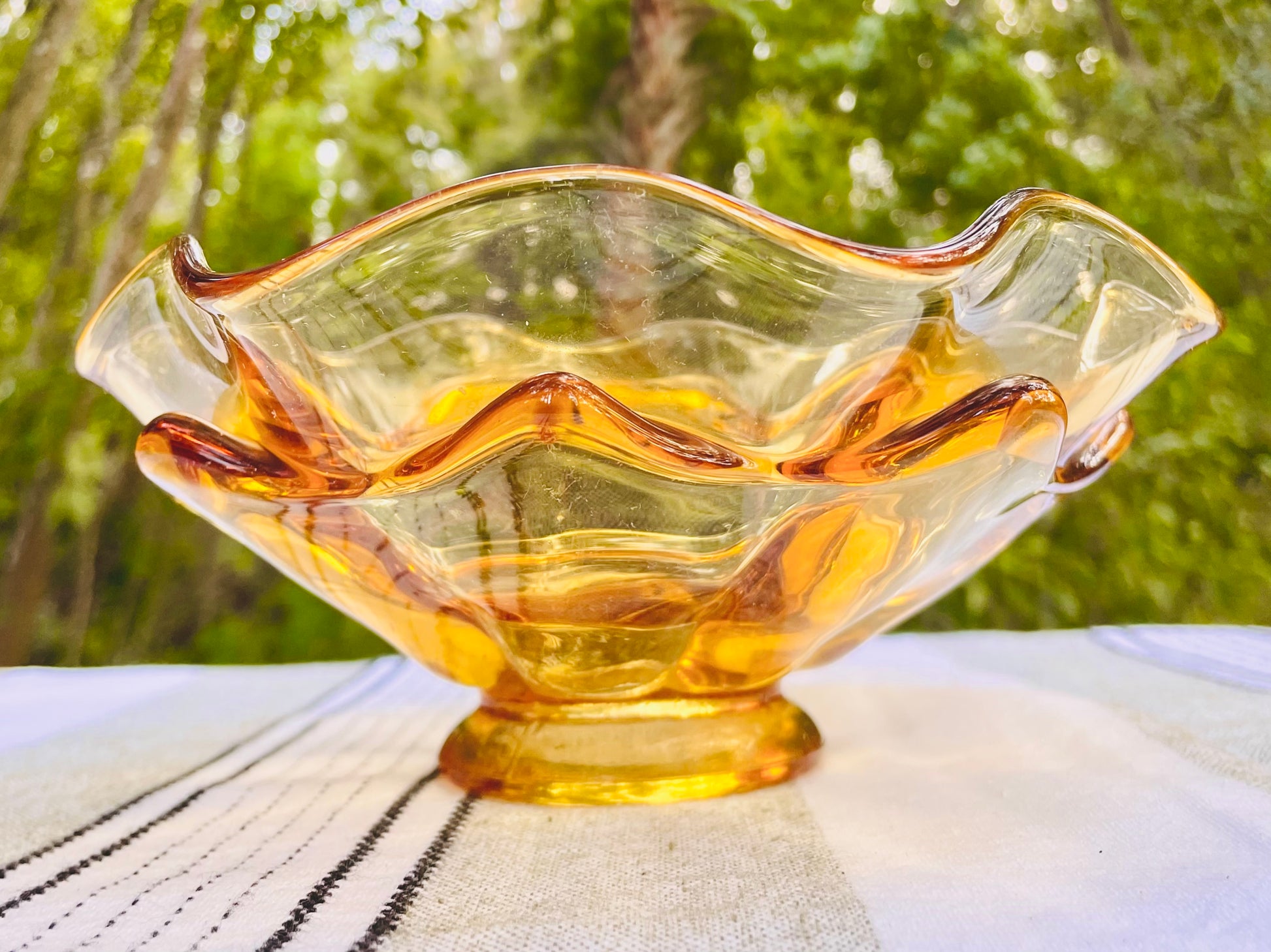 viking glass bowl, viking epic bowl, double ruffle viking, double crimped viking glass, amber viking glass, mid century modern viking, viking amber candy dish, 8 inch viking ruffled bowl, golden amber viking bowl, viking glass company, mcm art glass bowl, vintage viking double ruffle, honey amber ruffled dish, west virginia glass, 1960s viking glass, viking persimmon bowl thebrokenbirdcompany free shipping vintage home decor mcm decor