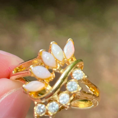 vintage_opal_and_lab_created_diamonds_on_gold_tone_ring_thebrokenbirdcompany_free_shipping_vintage_jewleryvintage opal and lab grown diamond leaf style statement ring avon vintage ring size 8.5 gift thebrokembirdcompany gift shiny ring 5 stone