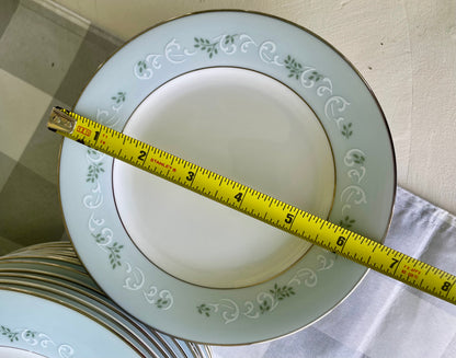Noritake's discontinued Martha #6344 pattern, produced from 1962-1968, a military-exclusive treasure hand-painted for American families abroad, now ready to steal the show at your next porch supper or holiday feast. Includes 95 pieces (listed below) adored with baby blue trim, white filigree designs mixed with green leafy accents, topped off with a beautiful platinum rim