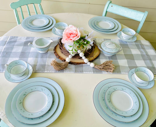 Noritake's discontinued Martha #6344 pattern, produced from 1962-1968, a military-exclusive treasure hand-painted for American families abroad, now ready to steal the show at your next porch supper or holiday feast. Includes 95 pieces (listed below) adored with baby blue trim, white filigree designs mixed with green leafy accents, topped off with a beautiful platinum rim