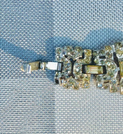 geometric silver links set with elongated baguette-cut clear rhinestones antique Rhinestone art deco bracelet geometric shapes 
hector aguilar jewelry
- taller borda taxco
- eagle 31 hallmark
- hector aguilar bracelet
- taxco sterling silver
- hector aguilar vintage
- mexican sterling bracelet
- eagle mark taxco
- hector aguilar art deco
- taxco eagle 31
- vintage jewelry 