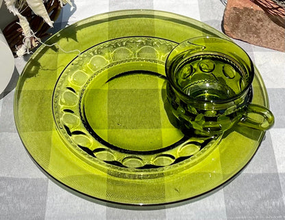 King’s Crown, Thumbprint glass, Indiana Glass, avocado green glass, vintage snack plate, luncheon plate, retro glassware, mid century glass, depression glass, olive green plate, cup and saucer set, thumbprint cup holder, 1970s kitchenware, vintage entertaining set, pressed glass, collectible glass
vintage indiana glass kings crown avocado green 10.5 plate retro thumbprint snack set with cup holder Thebrokenbirdcompany free shipping vintage indiana glass kings crown