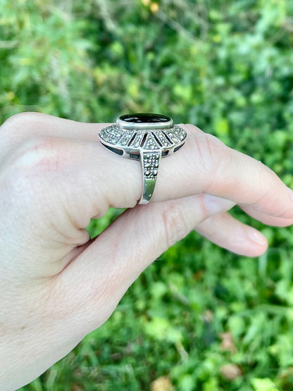 vintage sterling silver ring, black onyx marcasite ring, Art Deco style ring, oval halo ring, size 7 sterling ring, marcasite jewelry, black stone ring, vintage silver ring, geometric marcasite ring, onyx cocktail ring, mid-century sterling ring, baguette halo ring, estate jewelry, antique style silver ring Thebrokenbirdcompany free shipping