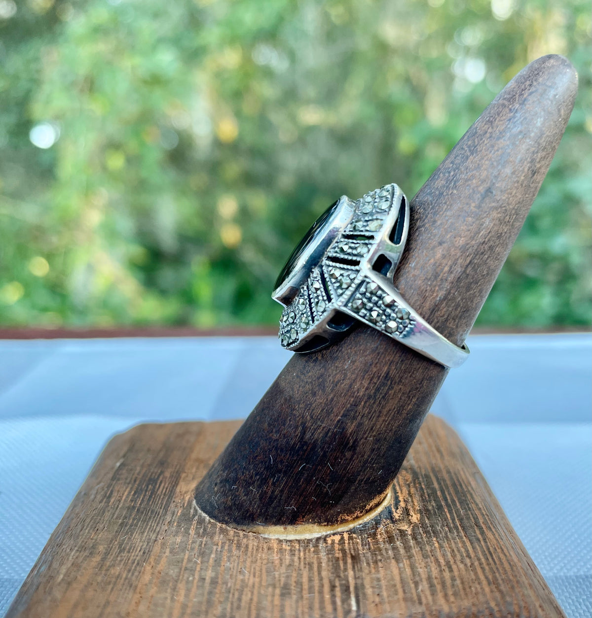 vintage sterling silver ring, black onyx marcasite ring, Art Deco style ring, oval halo ring, size 7 sterling ring, marcasite jewelry, black stone ring, vintage silver ring, geometric marcasite ring, onyx cocktail ring, mid-century sterling ring, baguette halo ring, estate jewelry, antique style silver ring Thebrokenbirdcompany free shipping