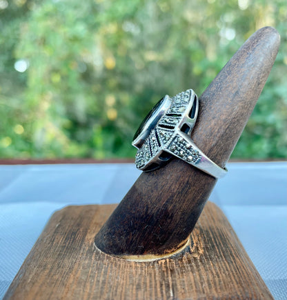 vintage sterling silver ring, black onyx marcasite ring, Art Deco style ring, oval halo ring, size 7 sterling ring, marcasite jewelry, black stone ring, vintage silver ring, geometric marcasite ring, onyx cocktail ring, mid-century sterling ring, baguette halo ring, estate jewelry, antique style silver ring Thebrokenbirdcompany free shipping
