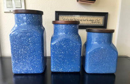 blue speckled canisters, ceramic canister set, farmhouse kitchen decor, kitchen storage jars, wooden lid canisters, set of 3 canisters, rustic kitchen storage, blue kitchen canisters, speckled ceramic jars, cottagecore kitchen, coastal farmhouse decor, countertop storage, vintage style canisters, blue and white kitchen jars, farmhouse canisters, ceramic storage set Thebrokenbirdcompany free shipping
