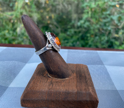 amber ring   - sterling silver amber ring   - oval amber ring   - halo amber ring   - rope halo ring   - braided silver ring   - natural amber inclusions   - cabochon amber ring   - baltic amber ring   - vintage amber ring   - statement amber ring   - size 6 amber ring   - sterling silver halo ring   - boho amber jewelry   - natural sediment amber cognac amber ring  fossilized resin ring Thebrokenbirdcompany free shipping gift for her