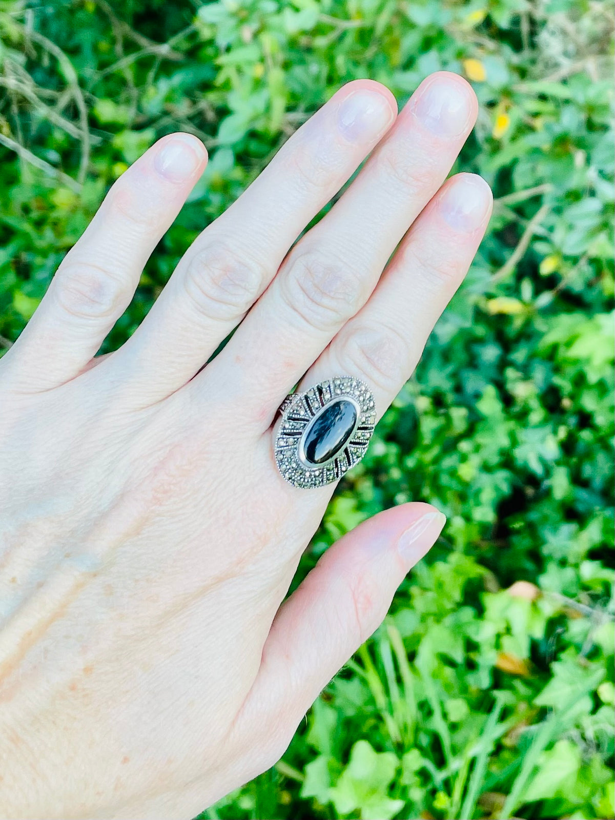 vintage sterling silver ring, black onyx marcasite ring, Art Deco style ring, oval halo ring, size 7 sterling ring, marcasite jewelry, black stone ring, vintage silver ring, geometric marcasite ring, onyx cocktail ring, mid-century sterling ring, baguette halo ring, estate jewelry, antique style silver ring Thebrokenbirdcompany free shipping