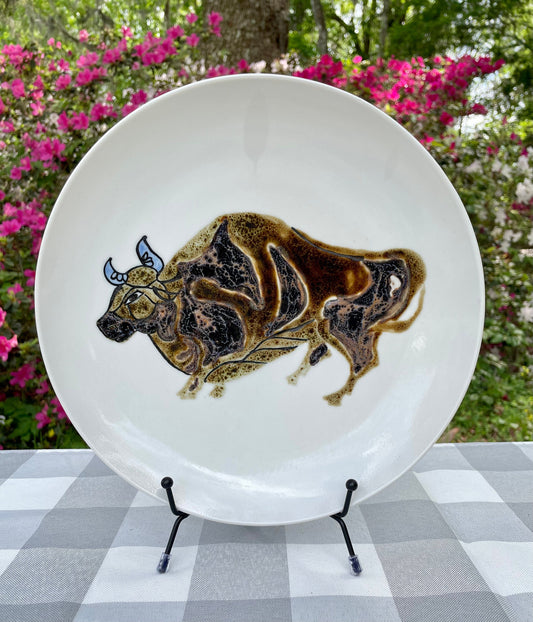vintage ceramic plate, hand painted bull plate, stylized bull ceramic, Taurus plate, decorative charger plate, mid century pottery, studio pottery plate, white ceramic wall plate, animal motif plate, zodiac Taurus decor, art pottery bull, 10 inch ceramic plate, hand painted pottery, folk art plate, collector ceramic plate thebrokenbirdcompany free shipping