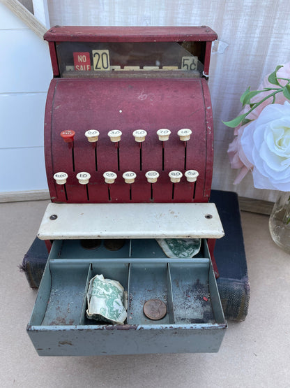 Vintage toy cash register Tom Thumb cash register 950s tin toy Retro cash register Metal toy cash register Antique toy register Collectible tin toys Western Stamping Co toy Mechanical cash register toy Red tin cash register Nostalgic kids toy Vintage play money register Mid-century toy Tinplate cash register Childrens vintage toy Retro store play set Antique metal toy 50s era cash register Collectible childrens register Maroon toy cash register thebrokenbirdcompany gift for collector